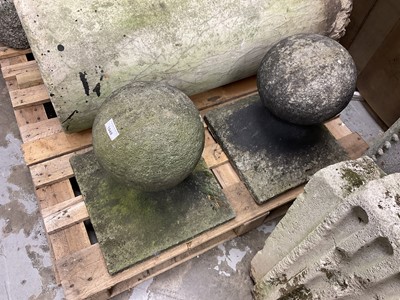 Lot 1948 - Pair of reconstituted garden balls on flared square bases, 35.5cm square x 38cm high