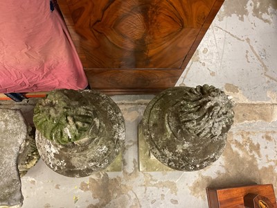 Lot 1949 - Pair of antique garden urns of wrythen fluted form, on square bases and superstate square plinths, 100cm high overall