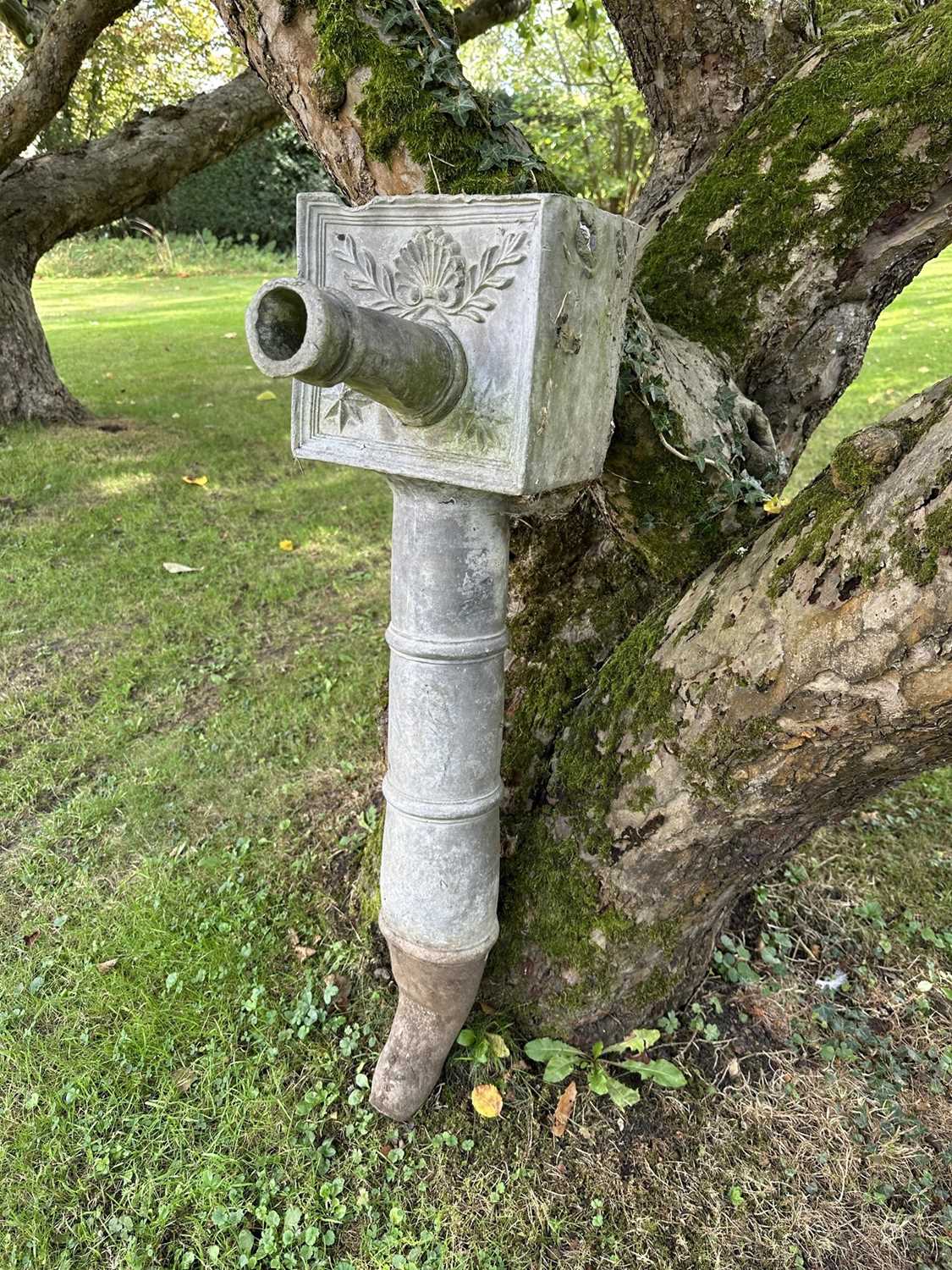 Lot 1951 - Georgian lead hopper of typical form, with shell and star motifs, 89cm high overall