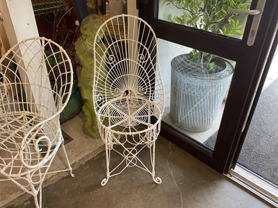 Lot 1957 - Group of white painted wire-work garden furniture comprising two elbow chairs, a standard chair and a low round table (4)