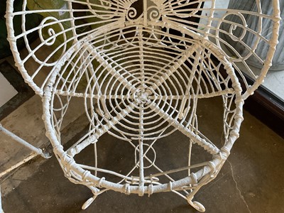 Lot 1957 - Group of white painted wire-work garden furniture comprising two elbow chairs, a standard chair and a low round table (4)