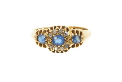 Lot 559 - Edwardian sapphire and diamond cluster ring, the central cluster flanked by two further sapphires