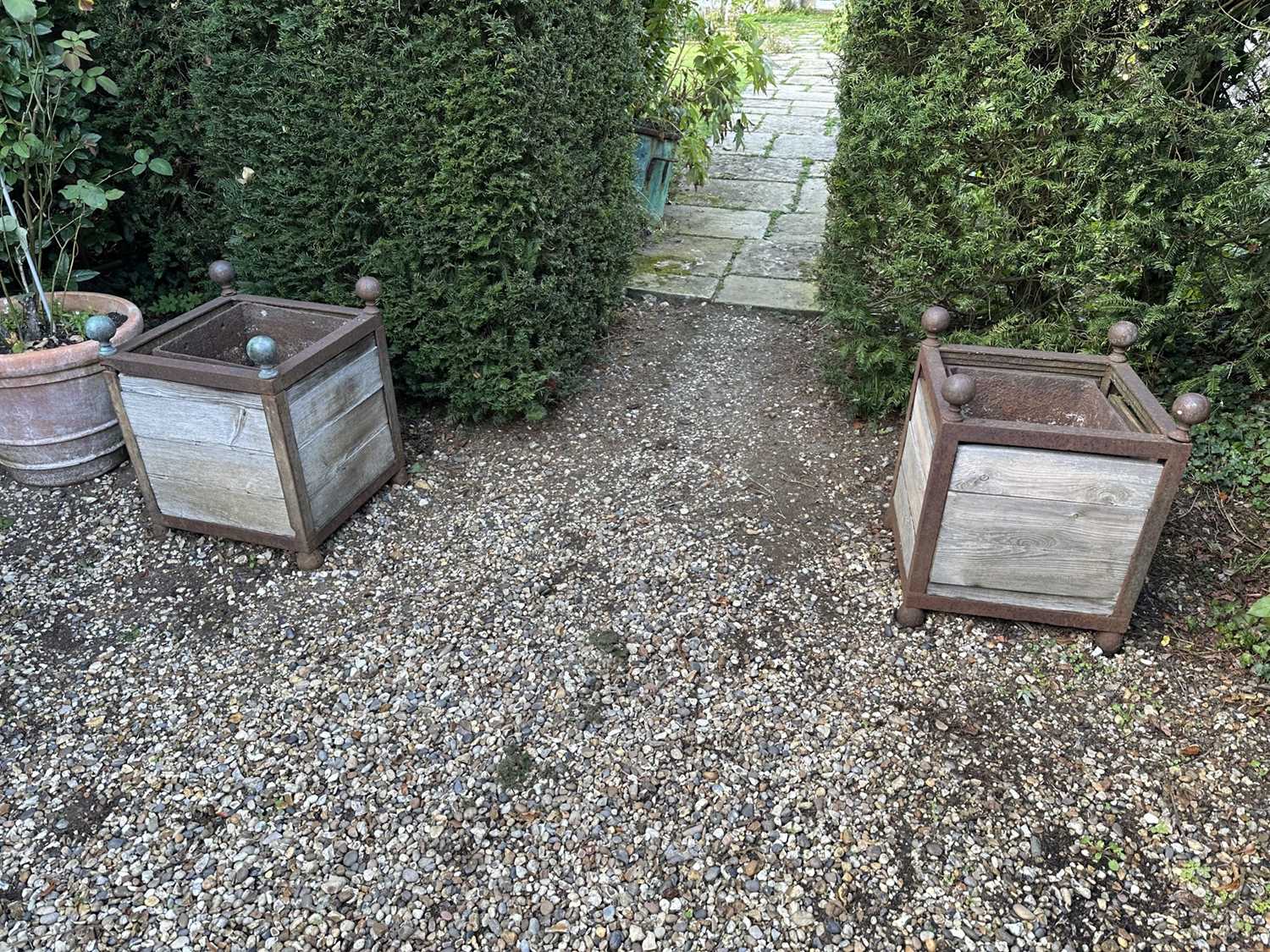 Lot 1960 - Pair of antique style cast iron and wooden Versailles planters, 47Cm square x 61cm high
