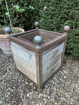 Lot 1960 - Pair of antique style cast iron and wooden Versailles planters, 47Cm square x 61cm high
