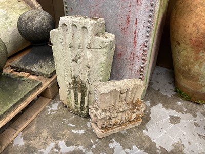 Lot 1966 - Antique carved stone corbel with central fluted panel, 57cm high x 33cm wide, together with another stone fragment (2)