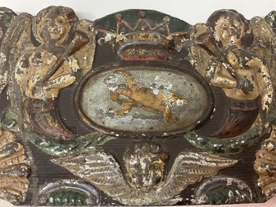 Lot 1883 - 18th century silk embroidered double sided picture, seraphim and crown ornament, glazed 16 x 21cm, together with an embossed tin plaque with similar ornament. (2)