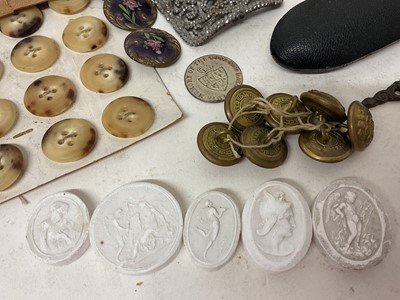 Lot 1884 - Collection of vertu items including buckles, buttons, bois durci plaque, figural inkwell, sculpture etc