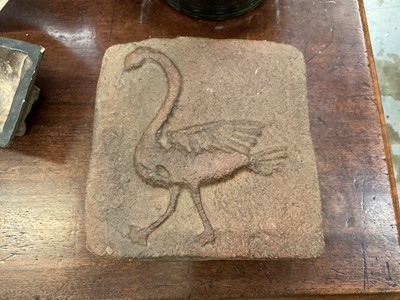 Lot 1891 - Pair of ancient relief moulded tiles, each with raised bird, 19 x 21cm