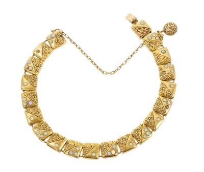 Lot 594 - Edwardian yellow metal and opal bracelet