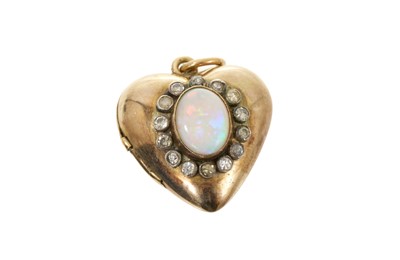 Lot 601 - Edwardian-style opal and diamond heart shaped locket