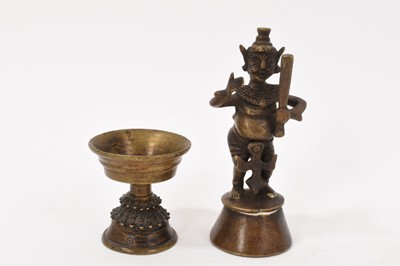 Lot 993 - Tibetan copper and brass snuff bottle, a small figure and a stem cup