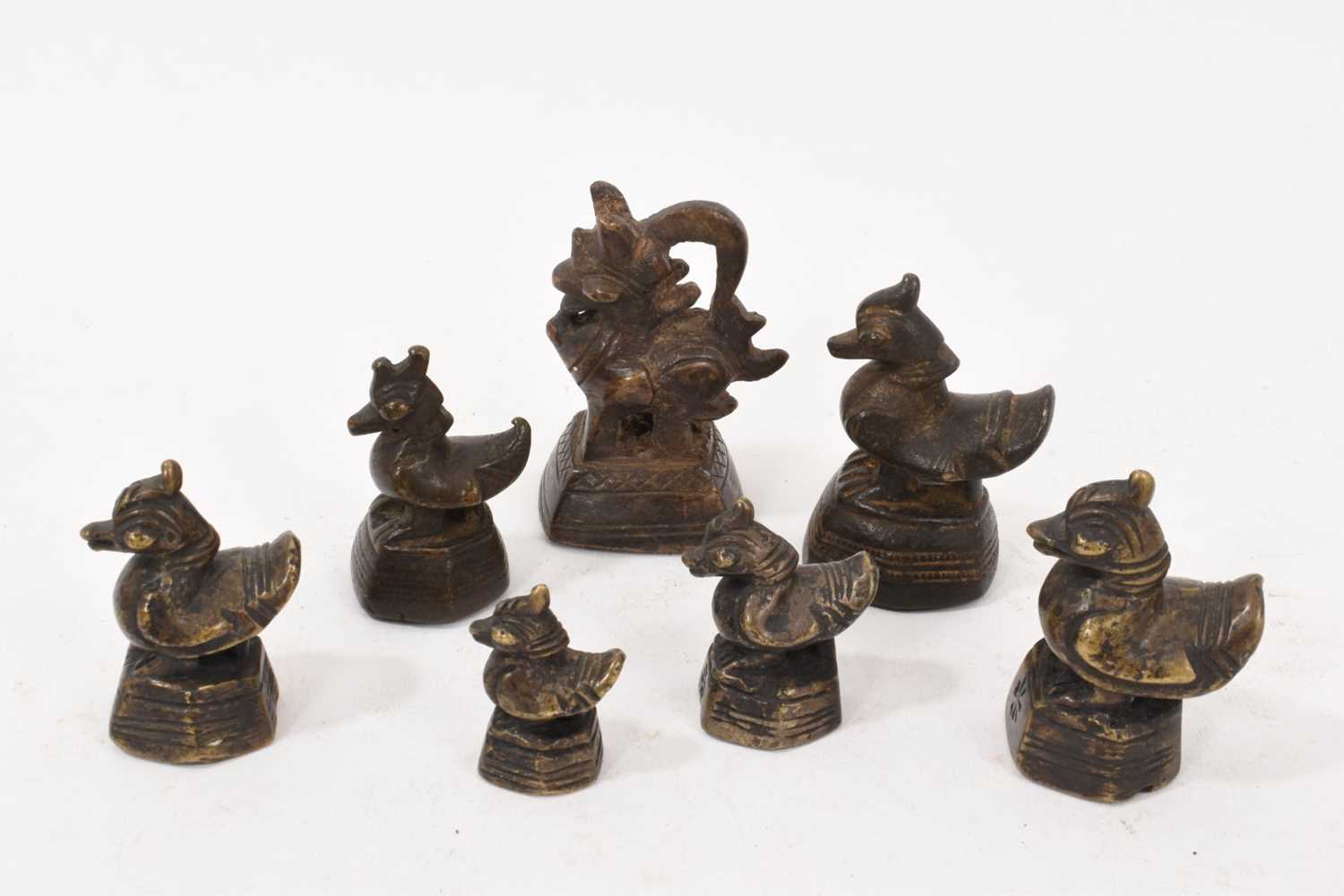 Lot 990 - Seven Chinese bronze bird shaped opium weights