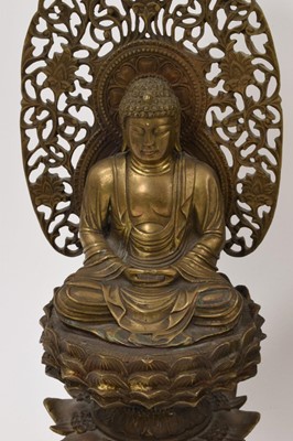 Lot 999 - Pair of Tibetan bronze seated figures