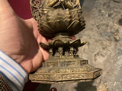 Lot 999 - Pair of Tibetan bronze seated figures