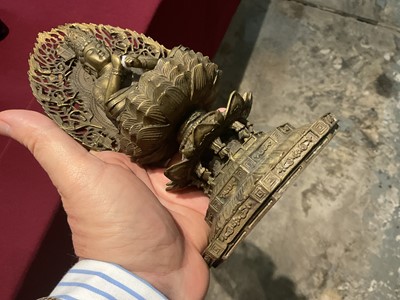Lot 999 - Pair of Tibetan bronze seated figures