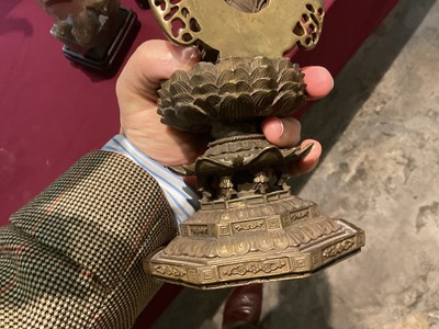 Lot 999 - Pair of Tibetan bronze seated figures