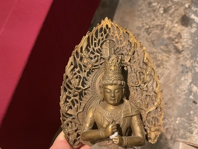 Lot 999 - Pair of Tibetan bronze seated figures