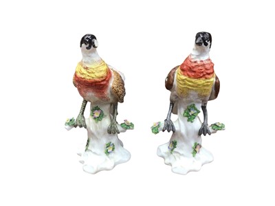 Lot 5284 - Pair of German porcelain models of birds on tree-stumps