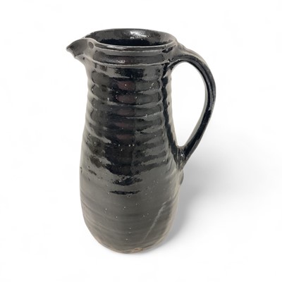 Lot 2371 - Large St. Ives Pottery jug, black glazed, with impressed marks including initials 'JB', probably for John Bedding (apprentice of Bernard Leach), 34.5cm high