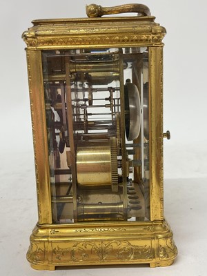 Lot 802 - 19th century gilt brass cased striking carriage clock with engraved decoration