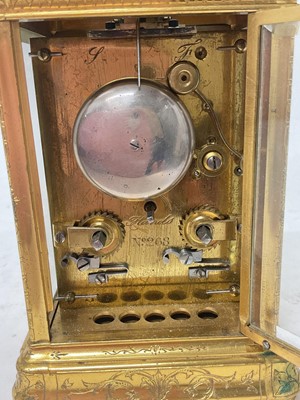 Lot 802 - 19th century gilt brass cased striking carriage clock with engraved decoration