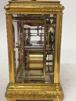 Lot 802 - 19th century gilt brass cased striking carriage clock with engraved decoration