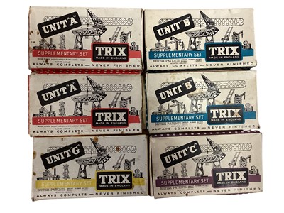Lot 1793 - The Trix Unit System Supplementary Sets Units A (x2), B (x2) C, D (x2) & G and Permag electric motor, all boxed, plus engineering manuals (poor) (1 box)