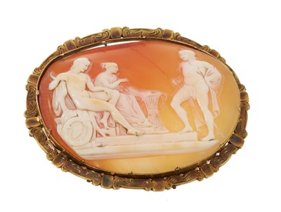 Lot 560 - 19th century Italian carved shell cameo depicting a seated couple and a spear-bearing Greek soldier, in a yellow metal engraved brooch mount