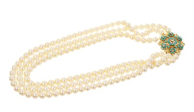 Lot 555 - 1960s cultured pearl three strand necklace with an 18ct gold turquoise and diamond flower head cluster clasp (London 1963)