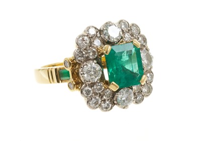 Lot 567 - A fine Emerald and diamond cluster ring