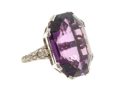 Lot 568 - Art Deco amethyst single stone ring with diamond set shoulders
