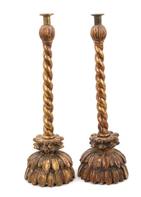 Lot 939 - Pair of early giltwood candlesticks, purportedly from the church of Santa Sofia