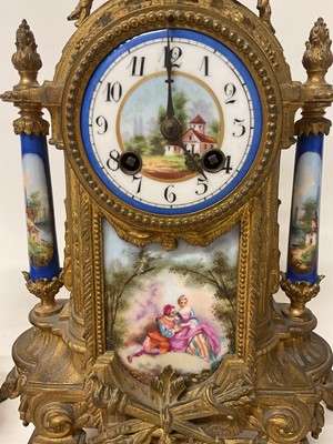 Lot 823 - Late 19th century French gilt metal and porcelain mounted clock garniture