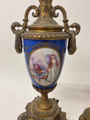 Lot 823 - Late 19th century French gilt metal and porcelain mounted clock garniture