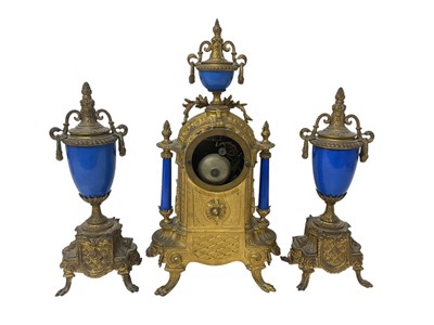 Lot 823 - Late 19th century French gilt metal and porcelain mounted clock garniture