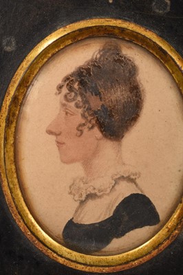 Lot 843 - Early 19th century portrait miniature on ivory, depicting a gentleman in white cravat and overcoat