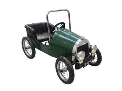 Lot 109 - Green childs pedal car, measuring 82cm long