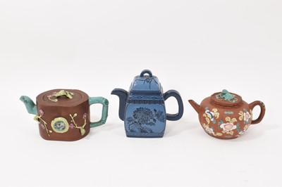 Lot 314 - Three Chinese Yixing teapots with enamelled decoration, two of them with seal marks (3)