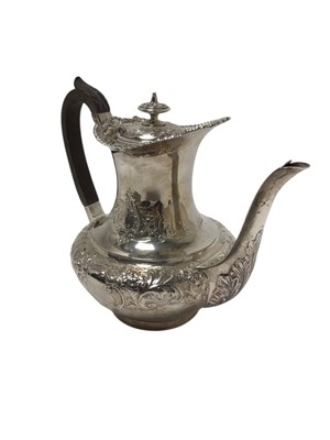Lot 441 - Late Victorian silver coffee pot of baluster form, with chased decoration, gadrooned border, domed hinged cover and ebonised wooden scroll handle, raised on a circul...