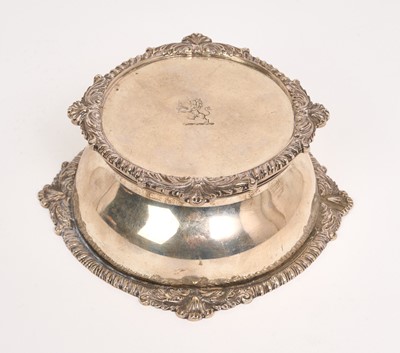 Lot 453 - Good quality George V silver inkwell, gadrooned and shell borders, with glass well having star cut base, (London 1925), maker Carrington & Co., 5cm in overall height, all at 10ozs.