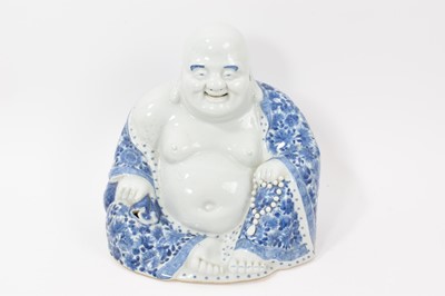 Lot 320 - Chinese blue and white porcelain figure of Buddha, with impressed marks to base