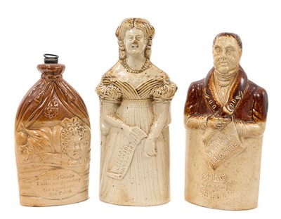 Lot 13 - Three salt glazed reform flasks including Mr and Mrs Caudle flask by Doulton and Watts, Greys Reform stoneware cordial bottle in the form of a politician holding The People's Rights Document, by...