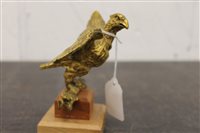 Lot 3808 - Gilt metal eagle mascot mounted on wooden...