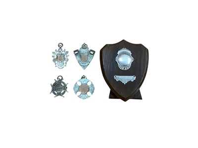 Lot 3049 - Four Victorian silver rowing fobs / medals engraved and. dated 189 7/ 1898 FWMSC Rowing Club and a 1950's plaque, (5).