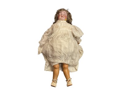Lot 1939 - Doll large Simon Halbig bisque head marked 13, blue sleeping eyes, dimple in chin, painted brows, lashes and lip, pierced ears, red dot in corner of eyes and nostrils, composite body and limbs, b...