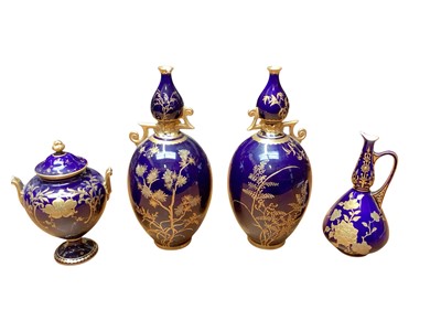 Lot 2216 - Pair of late Victorian Royal Crown Derby blue and gilt vases, together with a vase and cover and ewer (4)