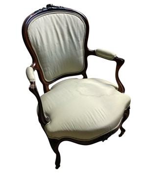 Lot 5304 - 19th century mahogany open armchair, with pad back and seat on cabriole legs and castors