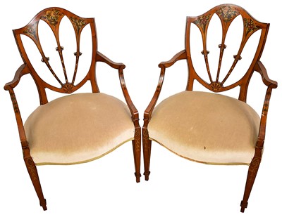 Lot 1251 - Pair of early 20th century satinwood open elbow chairs with painted floral bouquets, upholstered seats and square taper legs