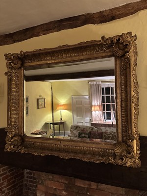 Lot 1268 - Good 19th century gilt wall mirror in deep frame with shell and acanthus corners