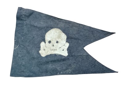 Lot 766 - Second World War Jolly Roger pirate flag / pennant stitched onto a black background, with naming for H.M.S. Trident, 46cm in width.
